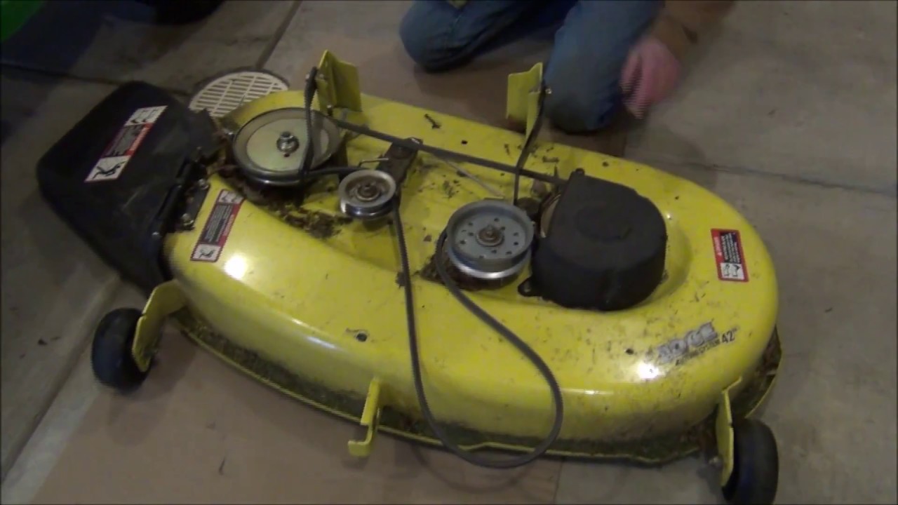 how to change a belt on a john deere l100